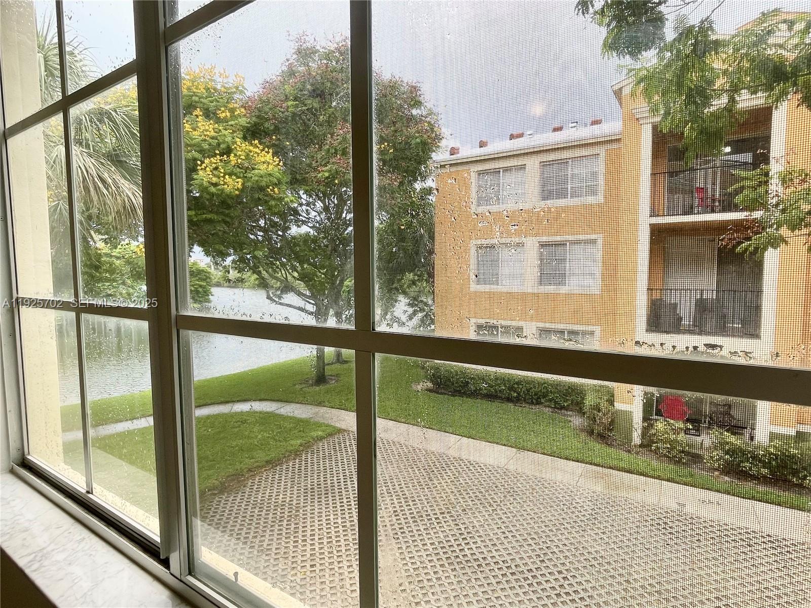 2080 West Preserve Way, Unit 207 Miramar, FL 33025 - Photo 7 of 20 a view of a building from a window