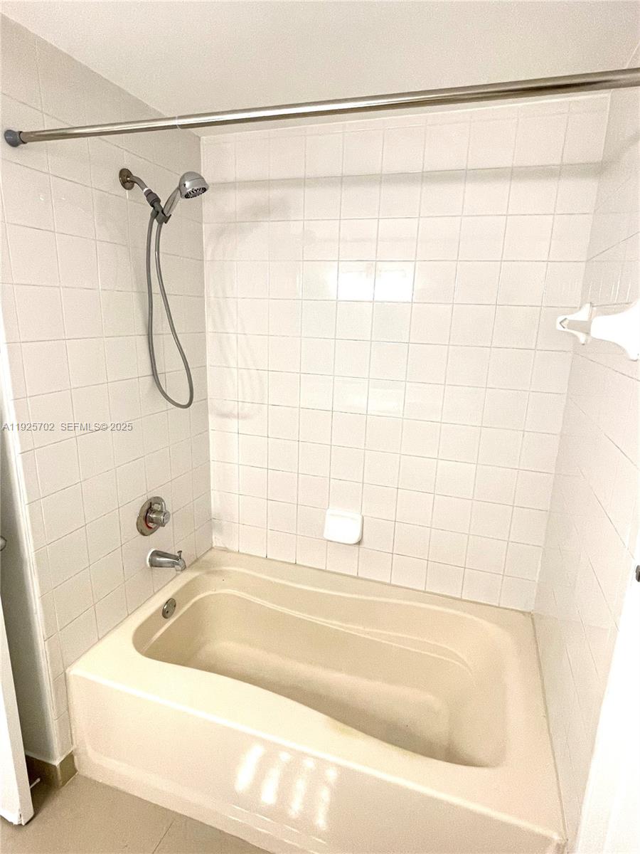 2080 West Preserve Way, Unit 207 Miramar, FL 33025 - Photo 10 of 20 a bathroom with a shower and a tub