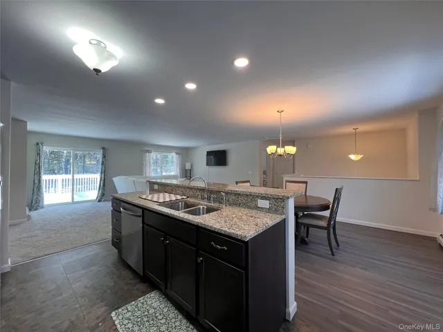 a kitchen with a stove and cabinets