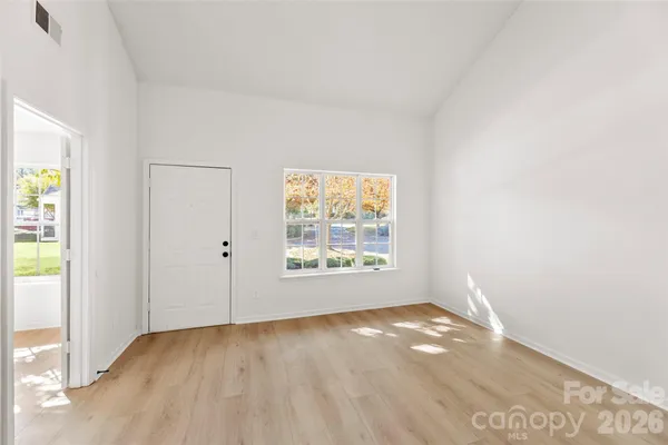 an empty room with windows