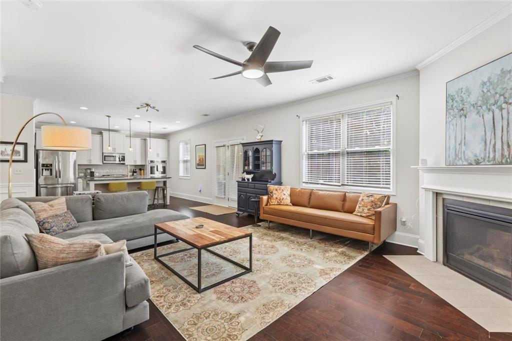 2426 Fair Oaks Way Atlanta, GA 30337 - Photo 13 of 29 a living room with furniture kitchen view and a fireplace