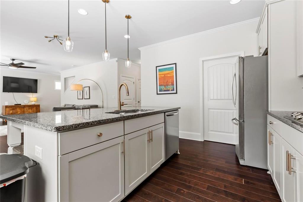 2426 Fair Oaks Way Atlanta, GA 30337 - Photo 16 of 29 a spacious bathroom with a granite countertop sink mirror and shower