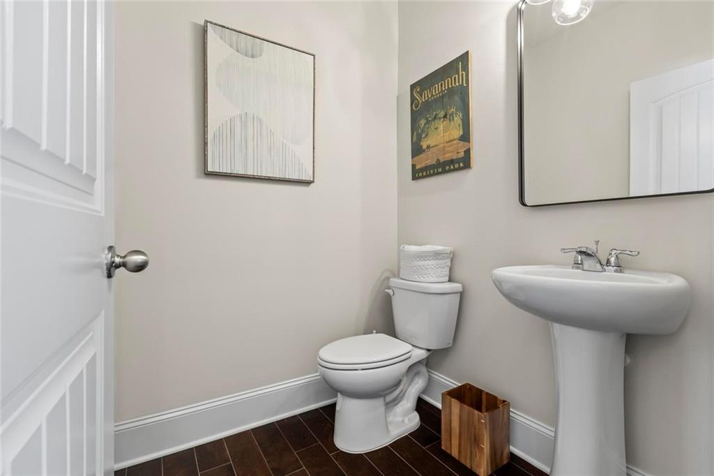 2426 Fair Oaks Way Atlanta, GA 30337 - Photo 10 of 29 a bathroom with a toilet and a sink