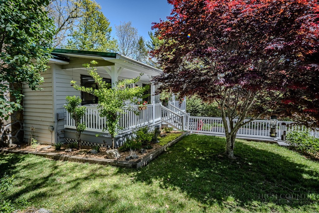 38 Rocky Meadows Road Newland, NC 28657 - Photo 35 of 50 a front view of a house with a yard