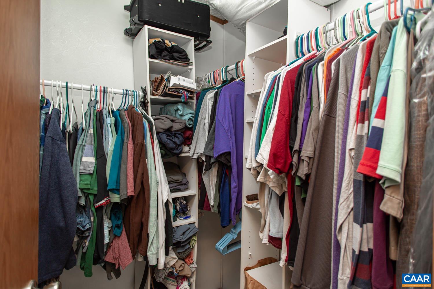 3147 Ridge Road Palmyra, VA 22963 - Photo 13 of 20 a view of walk in closet with clothes and shoes