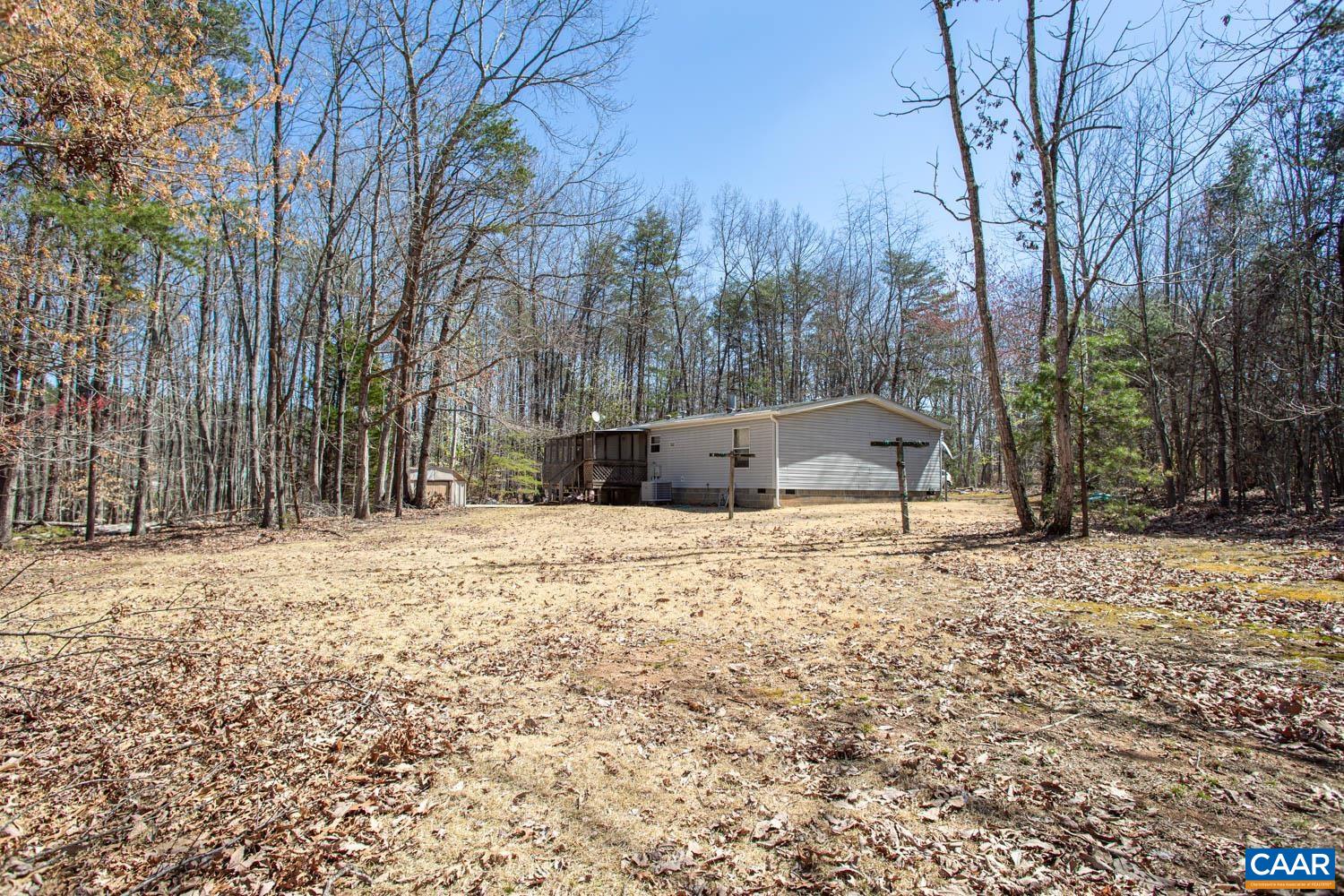 3147 Ridge Road Palmyra, VA 22963 - Photo 3 of 20 a view of a yard with snow on the road