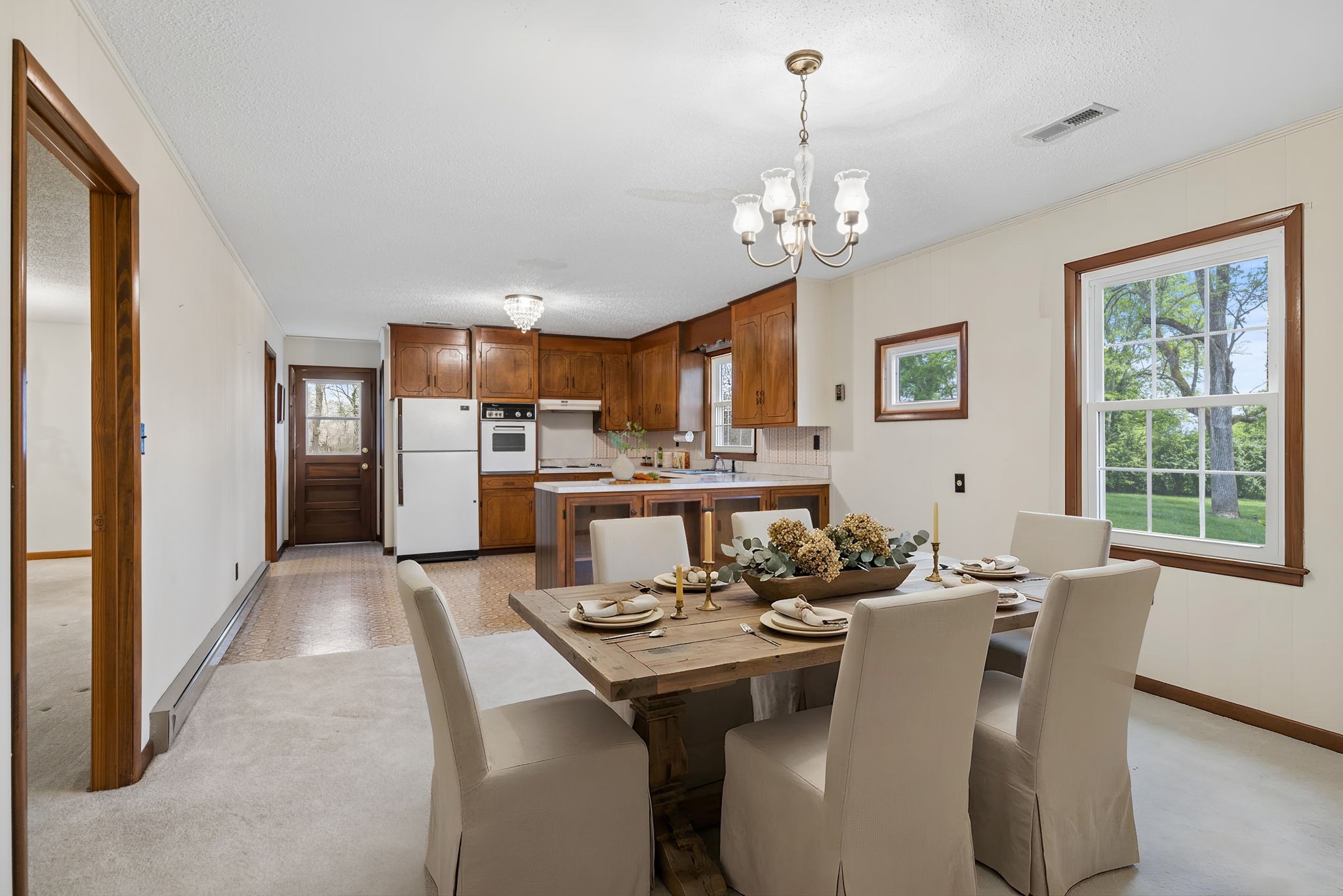 3335 Hill Town Road Santa Fe, TN 38482 - Photo 23 of 72 a view of a dining room with furniture a chandelier and window