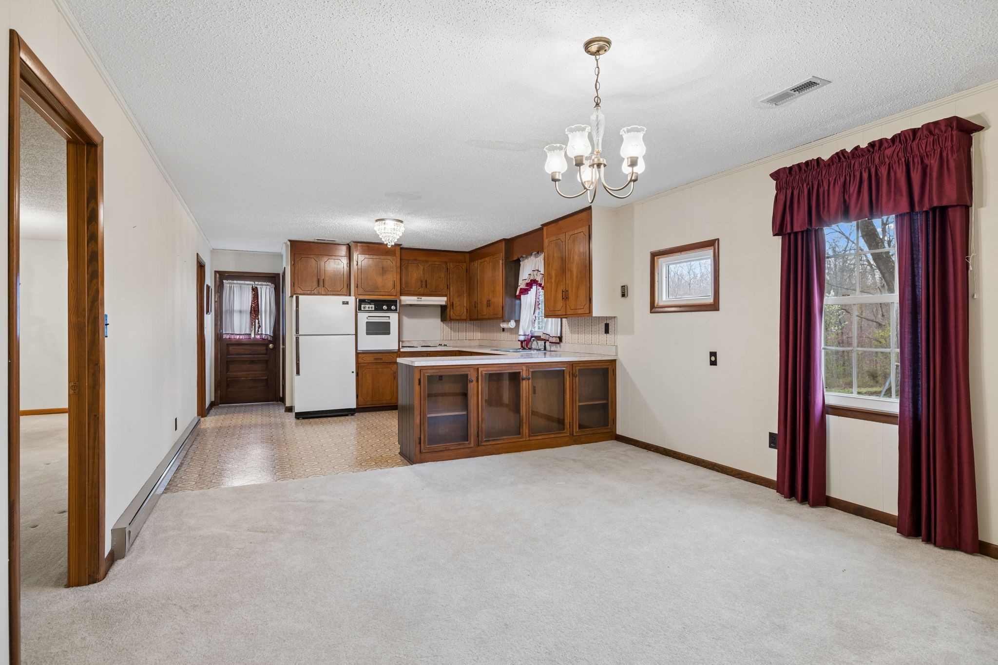3335 Hill Town Road Santa Fe, TN 38482 - Photo 24 of 72 a view of a kitchen with a sink cabinet and a fireplace