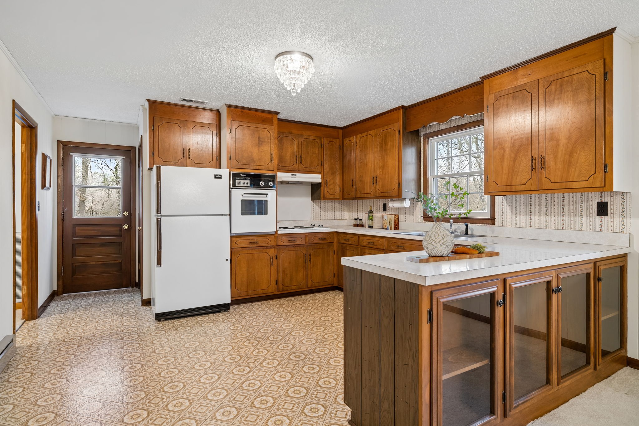 3335 Hill Town Road Santa Fe, TN 38482 - Photo 26 of 72 a kitchen that has a sink a refrigerator and a stove top oven