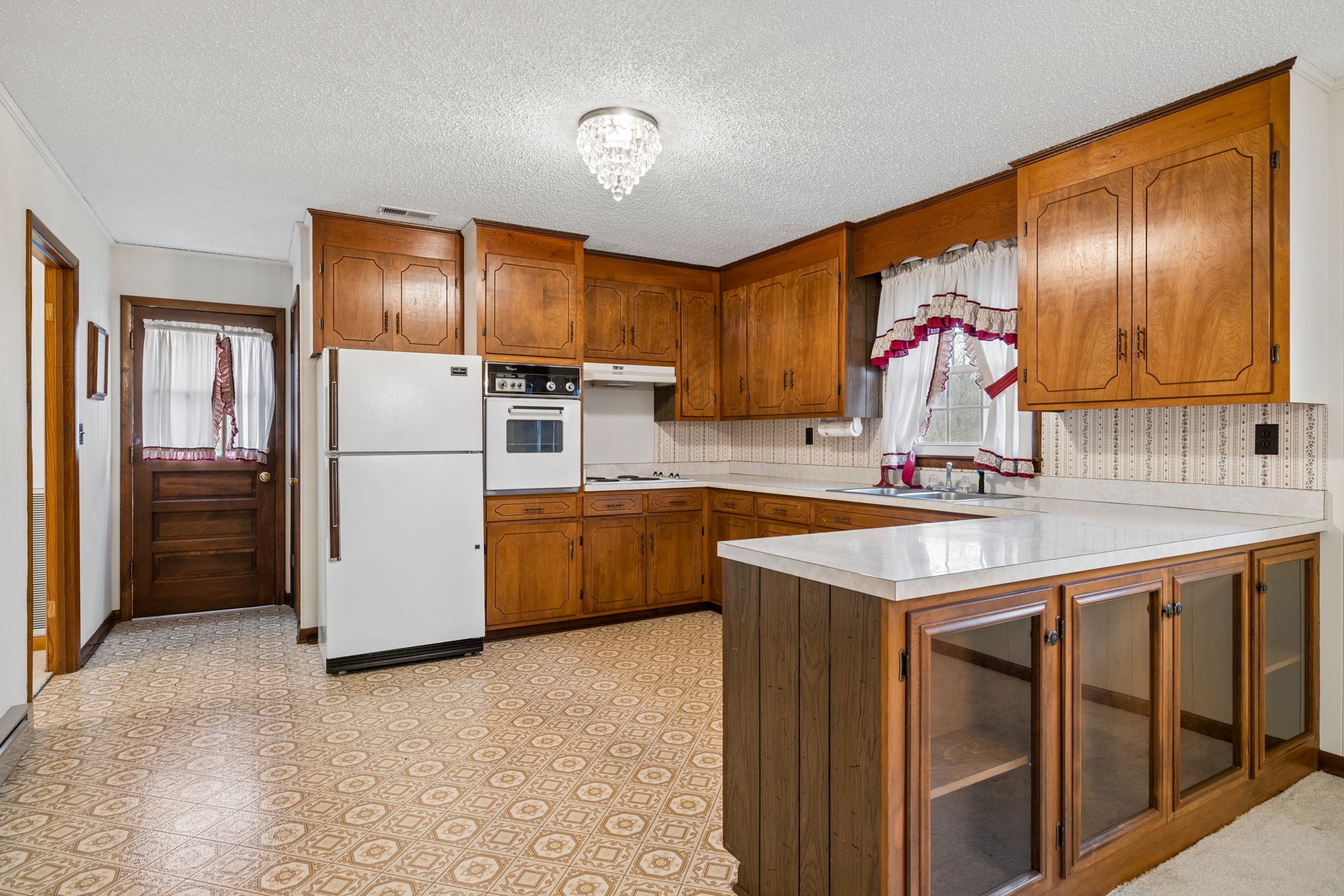 3335 Hill Town Road Santa Fe, TN 38482 - Photo 27 of 72 a kitchen that has a refrigerator a sink and a refrigerator