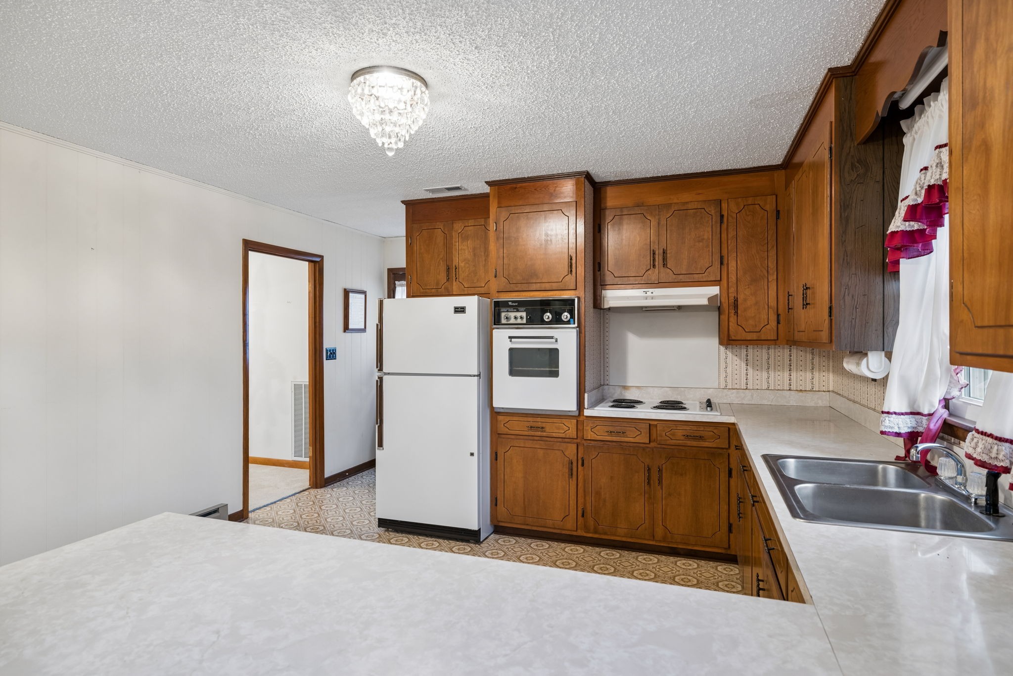 3335 Hill Town Road Santa Fe, TN 38482 - Photo 28 of 72 a kitchen with stainless steel appliances granite countertop a sink refrigerator and microwave