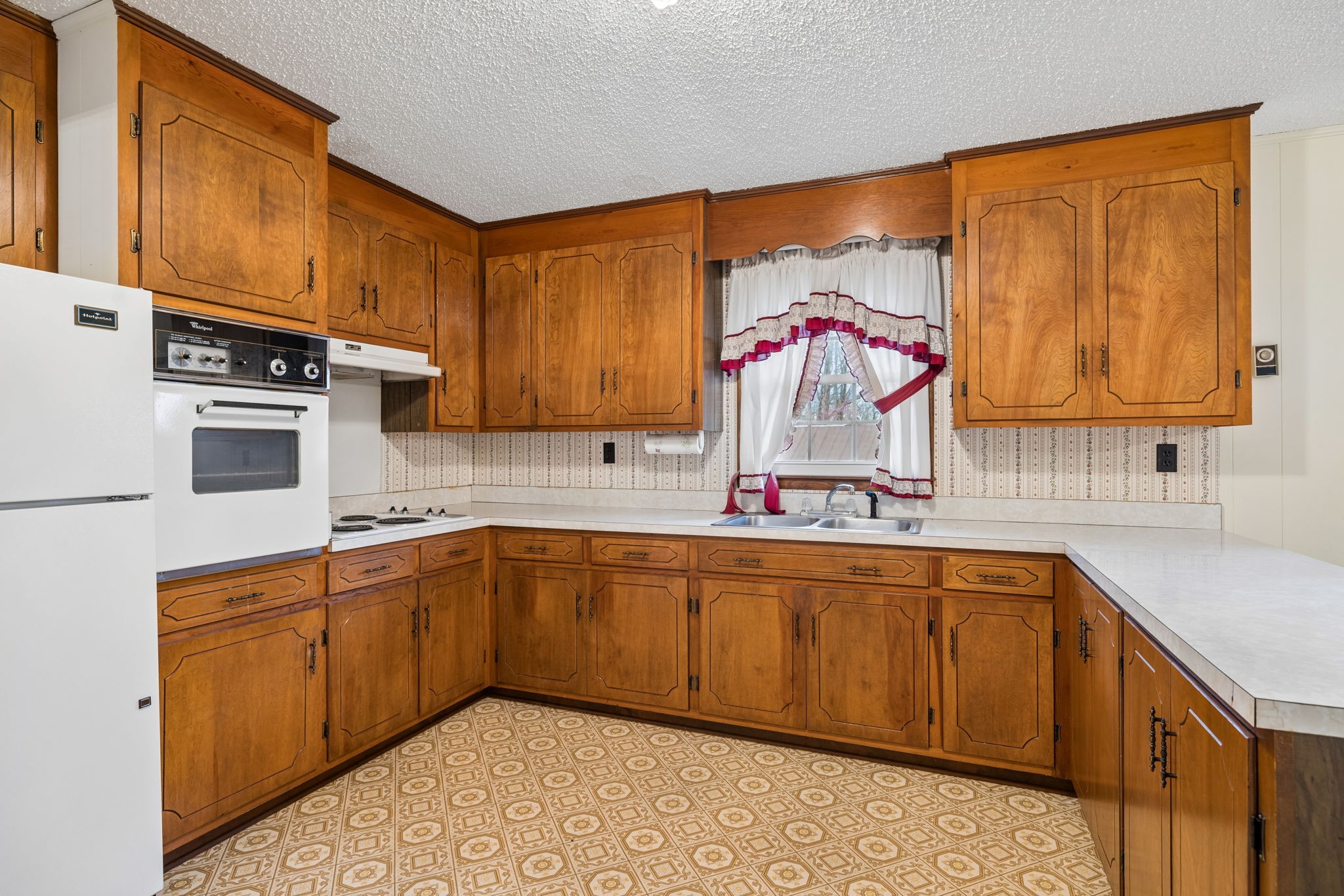 3335 Hill Town Road Santa Fe, TN 38482 - Photo 29 of 72 a kitchen with a sink stove and cabinets
