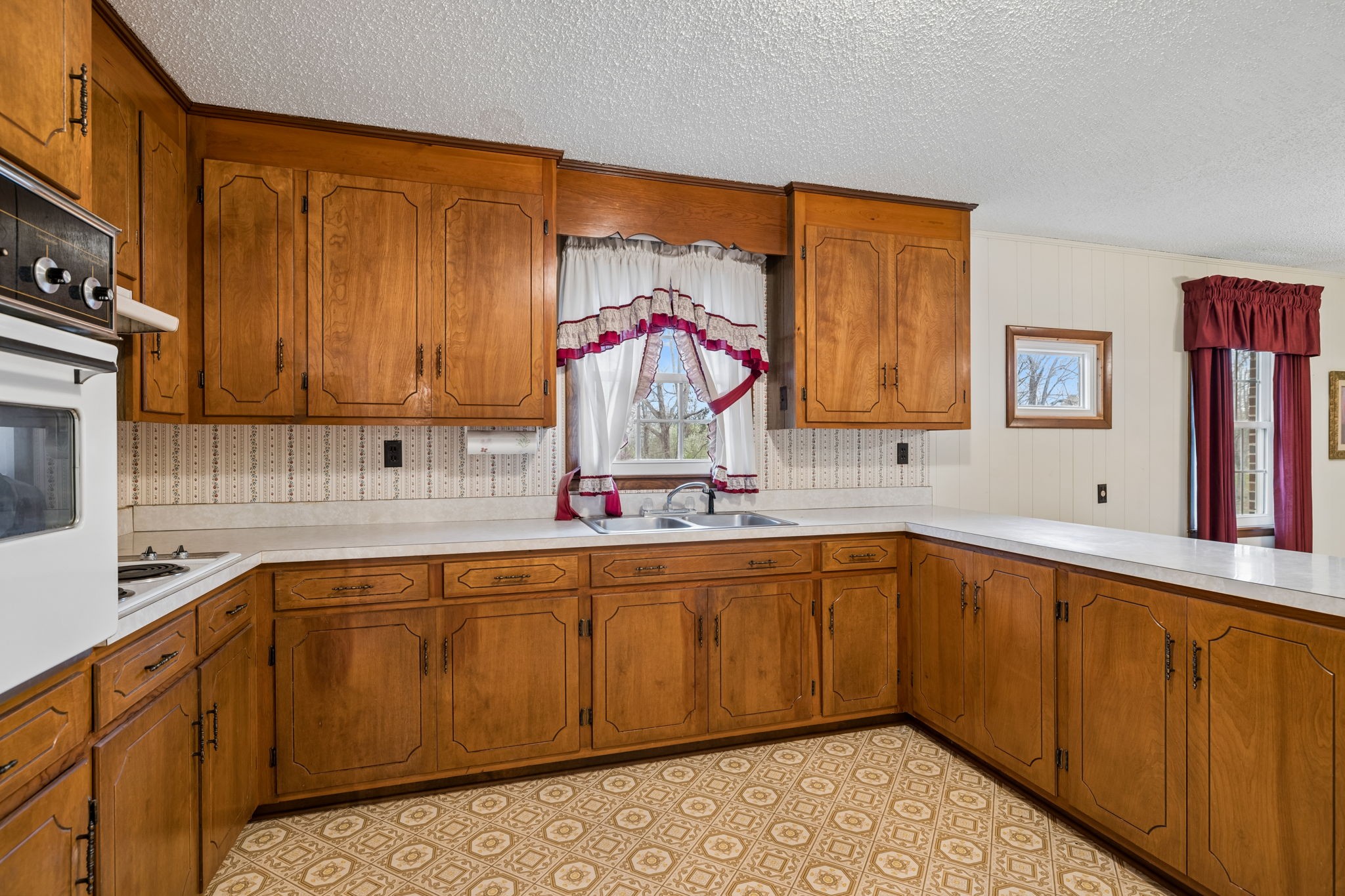 3335 Hill Town Road Santa Fe, TN 38482 - Photo 31 of 72 a kitchen with a sink cabinets and a window