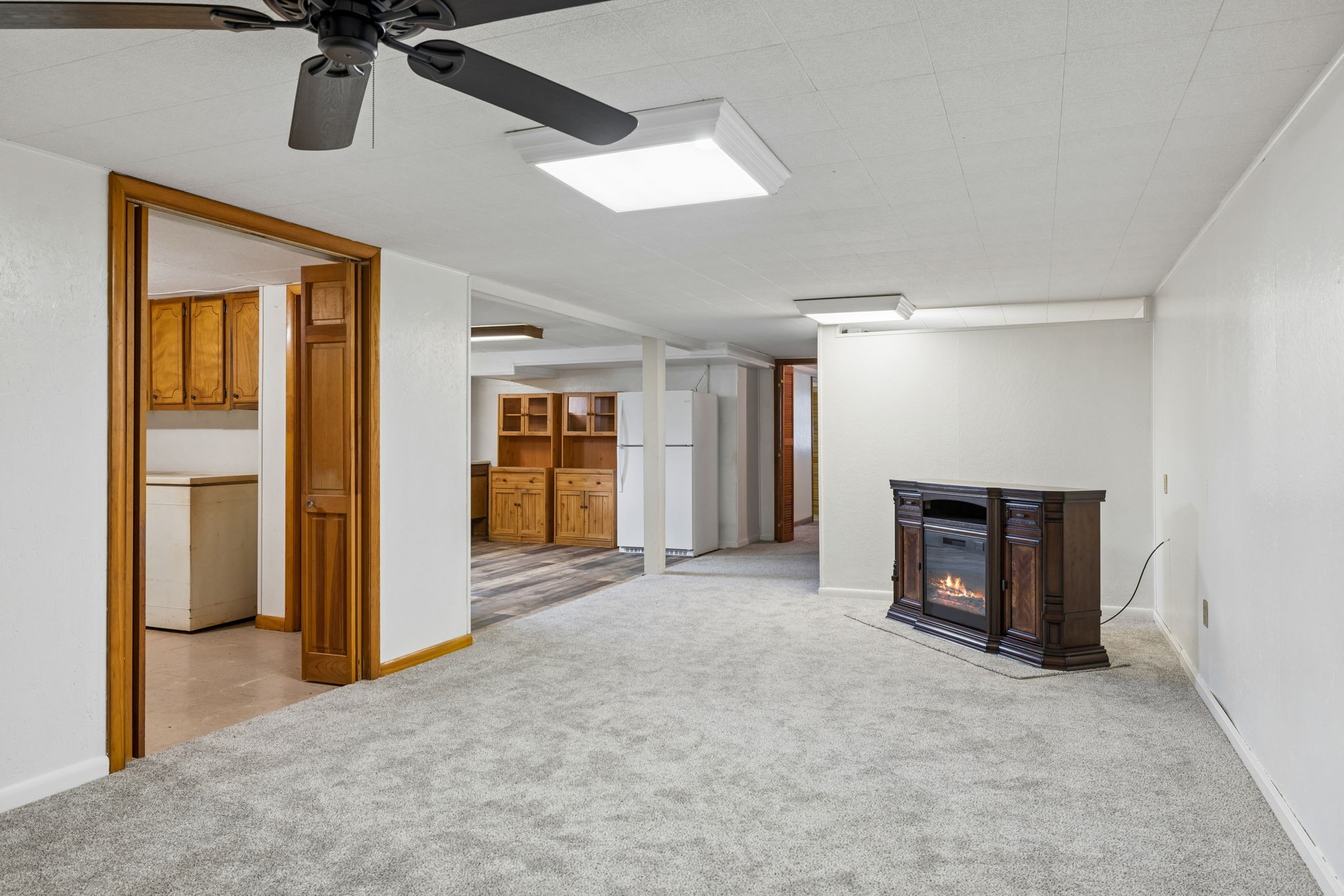 3335 Hill Town Road Santa Fe, TN 38482 - Photo 48 of 72 an empty room with a fireplace and windows