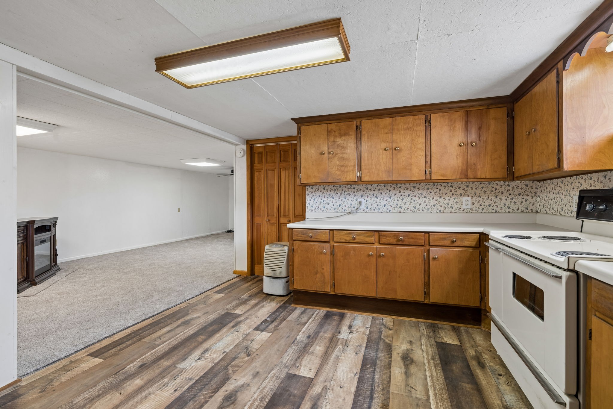 3335 Hill Town Road Santa Fe, TN 38482 - Photo 52 of 72 a kitchen with sink a microwave and cabinets