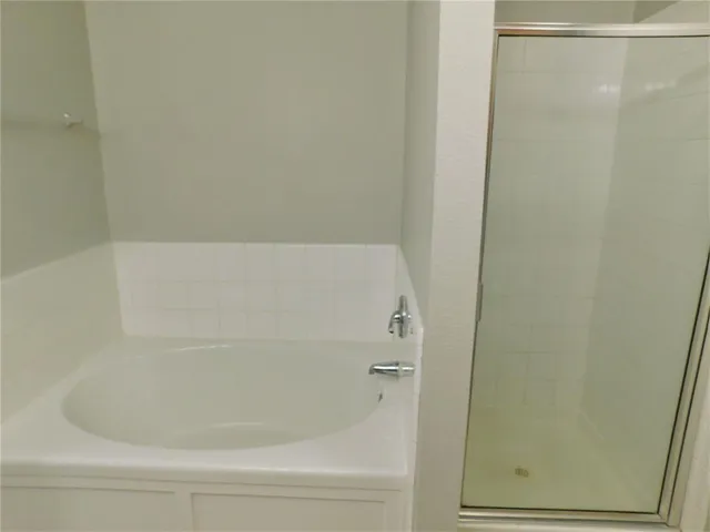 a close up of a bathtub in a bathroom