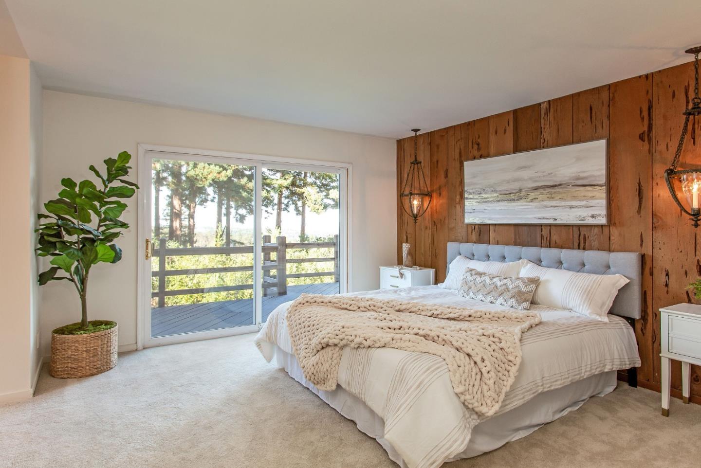 530 Summit Spring Road Woodside, CA 94062 - Photo 12 of 24 a bedroom with a bed and a potted plant