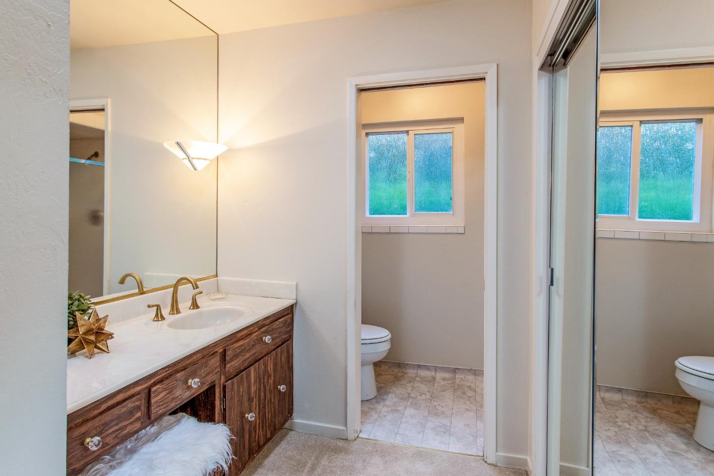 530 Summit Spring Road Woodside, CA 94062 - Photo 14 of 24 a bathroom with a sink a toilet and shower