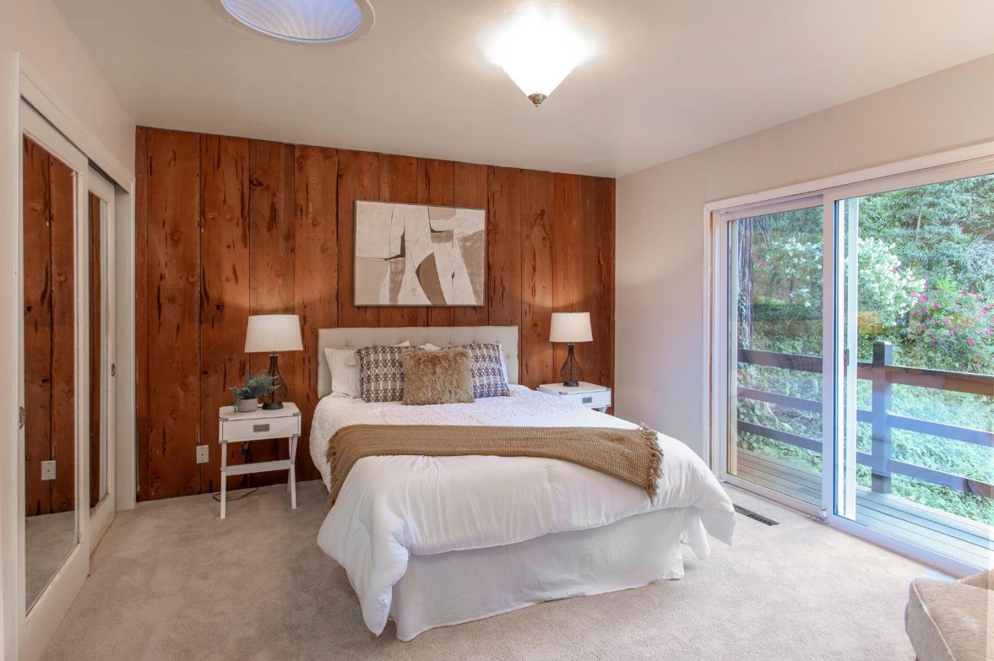 530 Summit Spring Road Woodside, CA 94062 - Photo 16 of 24 a bedroom with a bed and a large window