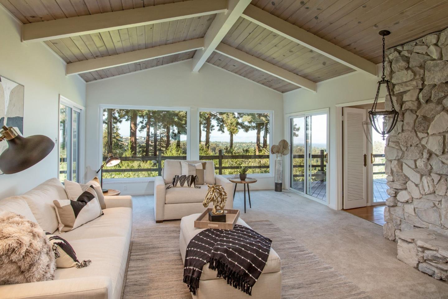 530 Summit Spring Road Woodside, CA 94062 - Photo 4 of 24 a living room with furniture and a floor to ceiling window