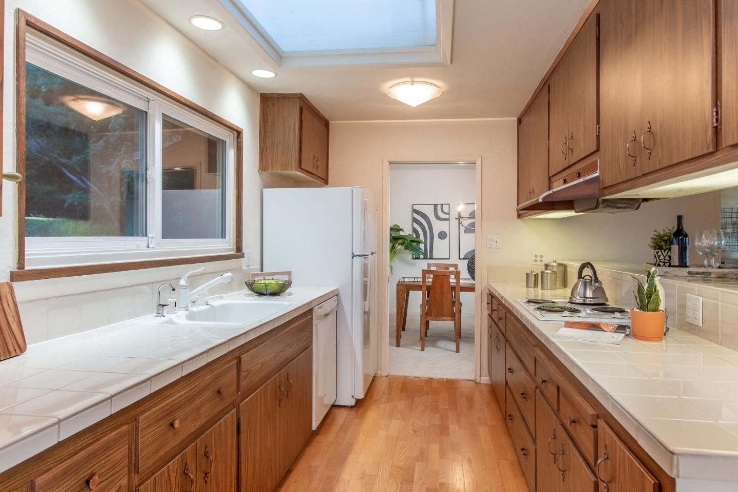 530 Summit Spring Road Woodside, CA 94062 - Photo 10 of 24 a kitchen with stainless steel appliances granite countertop a sink a stove and a refrigerator