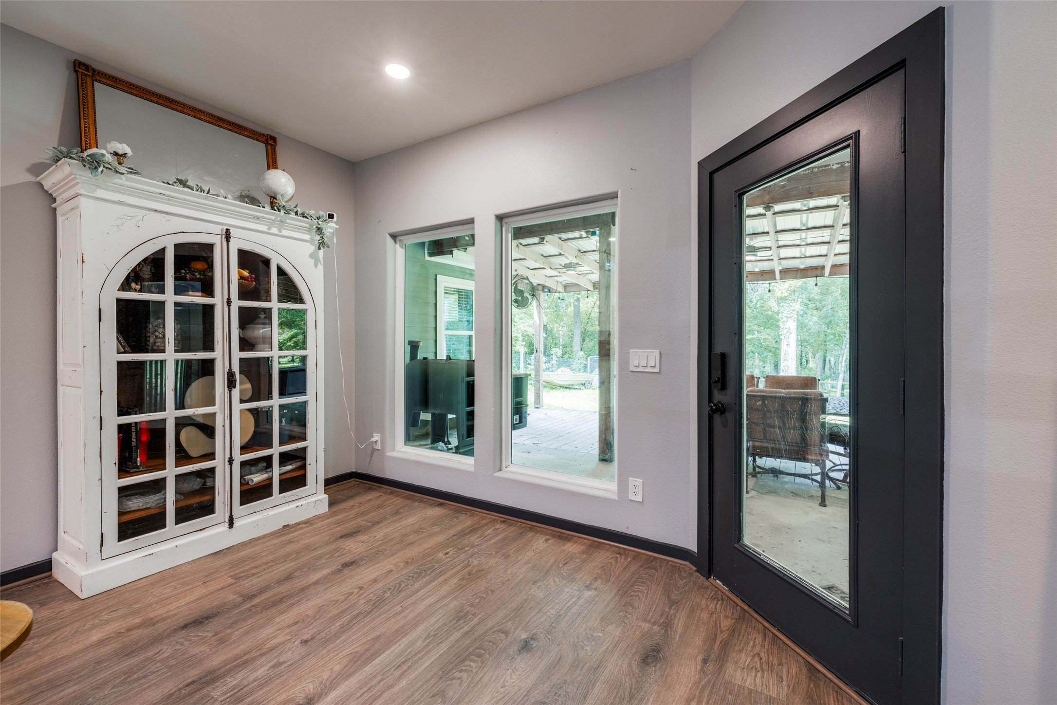 35 Disher Circle Huffman, TX 77336 - Photo 17 of 50 a view of a big room with wooden floor and windows