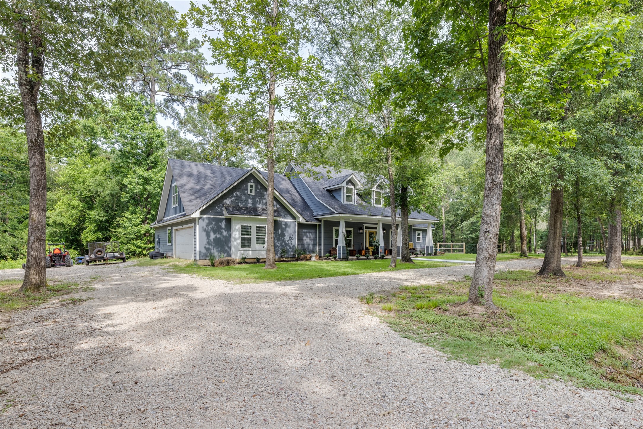 35 Disher Circle Huffman, TX 77336 - Photo 2 of 50 a front view of a house with a yard and trees