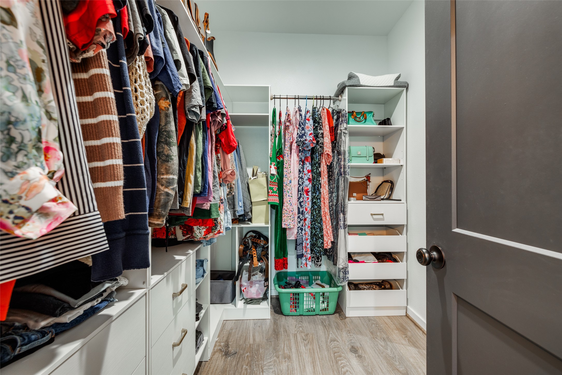 35 Disher Circle Huffman, TX 77336 - Photo 25 of 50 a view of walk in closet with clothes