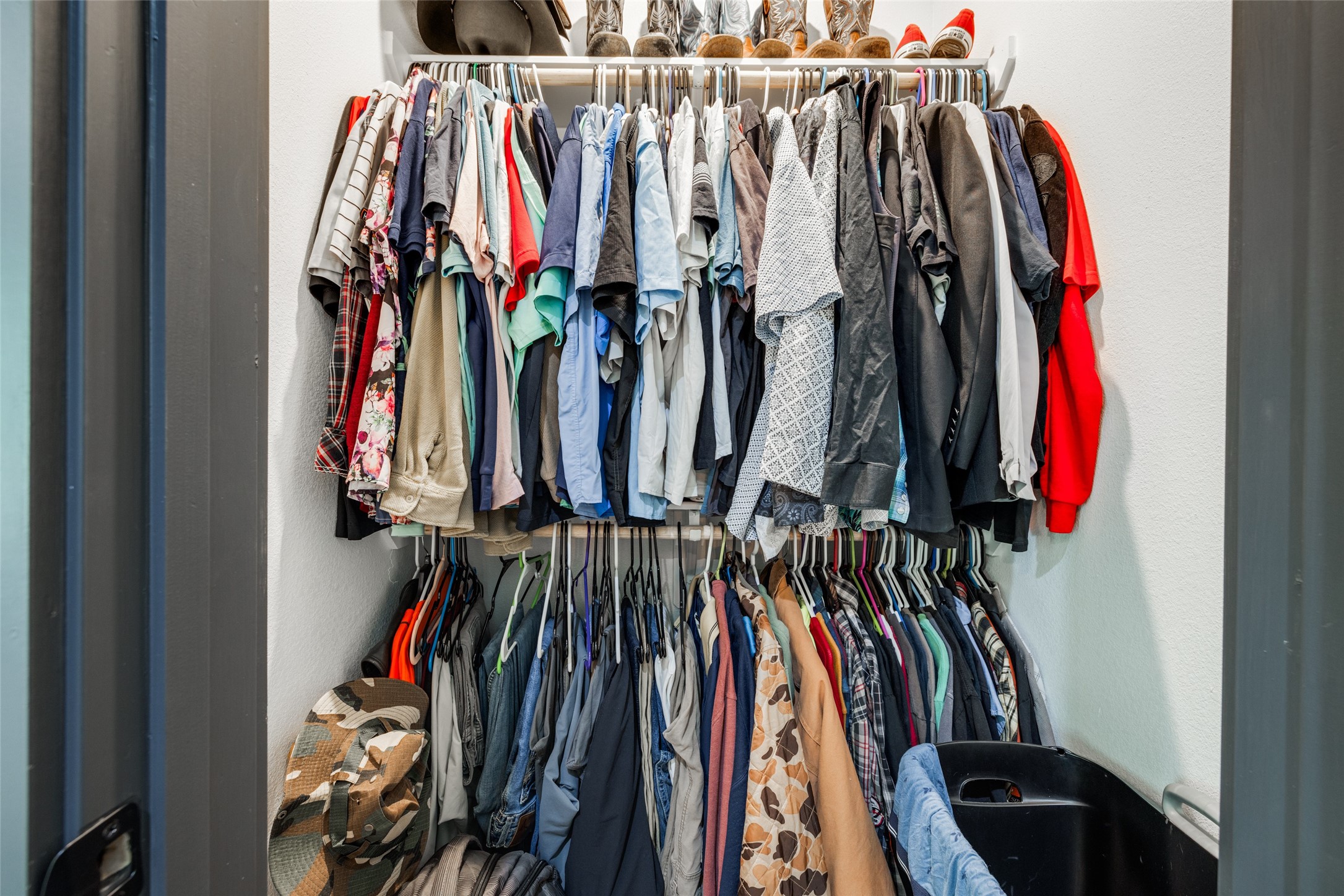 35 Disher Circle Huffman, TX 77336 - Photo 26 of 50 a view of walk in closet with clothes