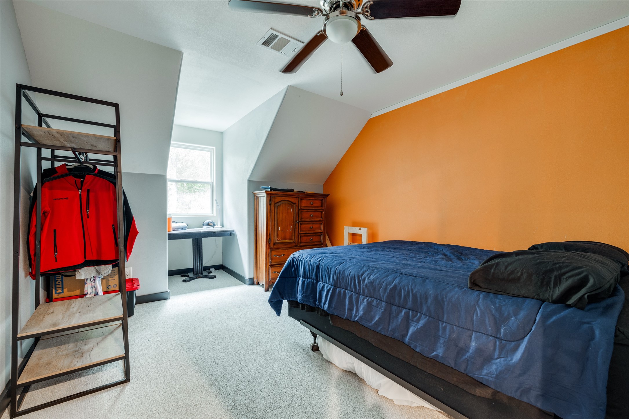 35 Disher Circle Huffman, TX 77336 - Photo 31 of 50 a bedroom with a bed and window