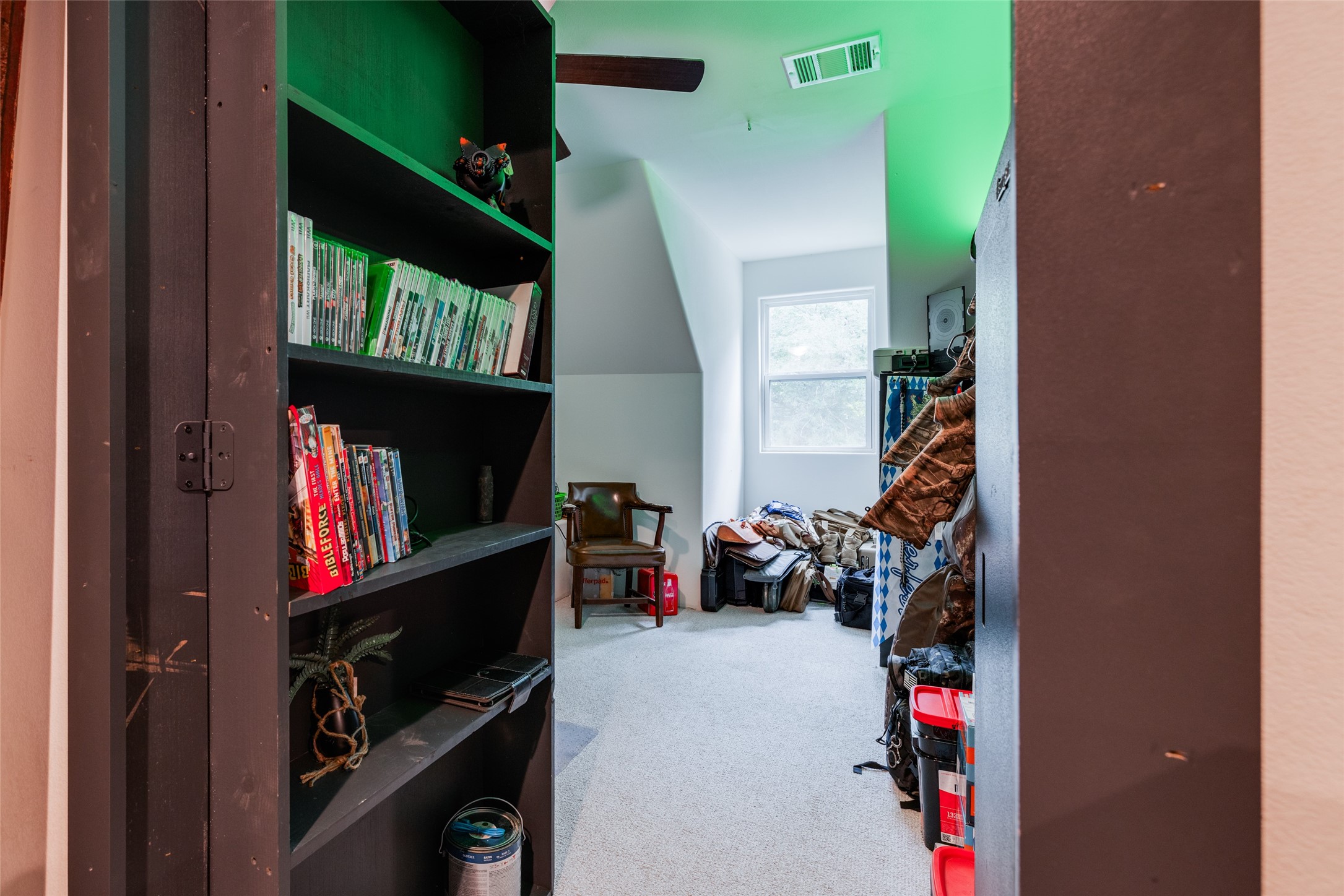 35 Disher Circle Huffman, TX 77336 - Photo 34 of 50 a view of kids room with clothes and shoes