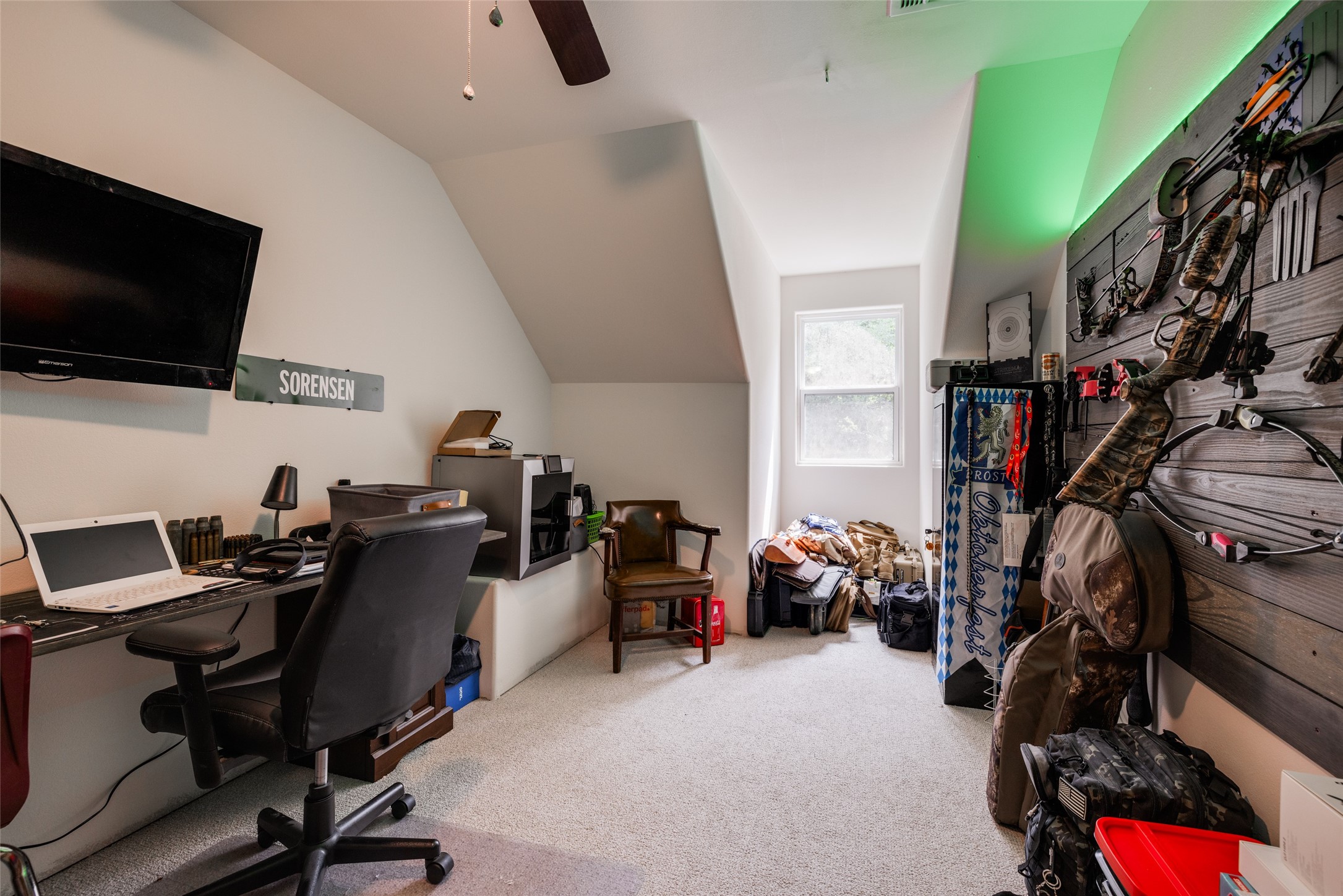35 Disher Circle Huffman, TX 77336 - Photo 35 of 50 a view of a workspace with furniture and a flat screen tv