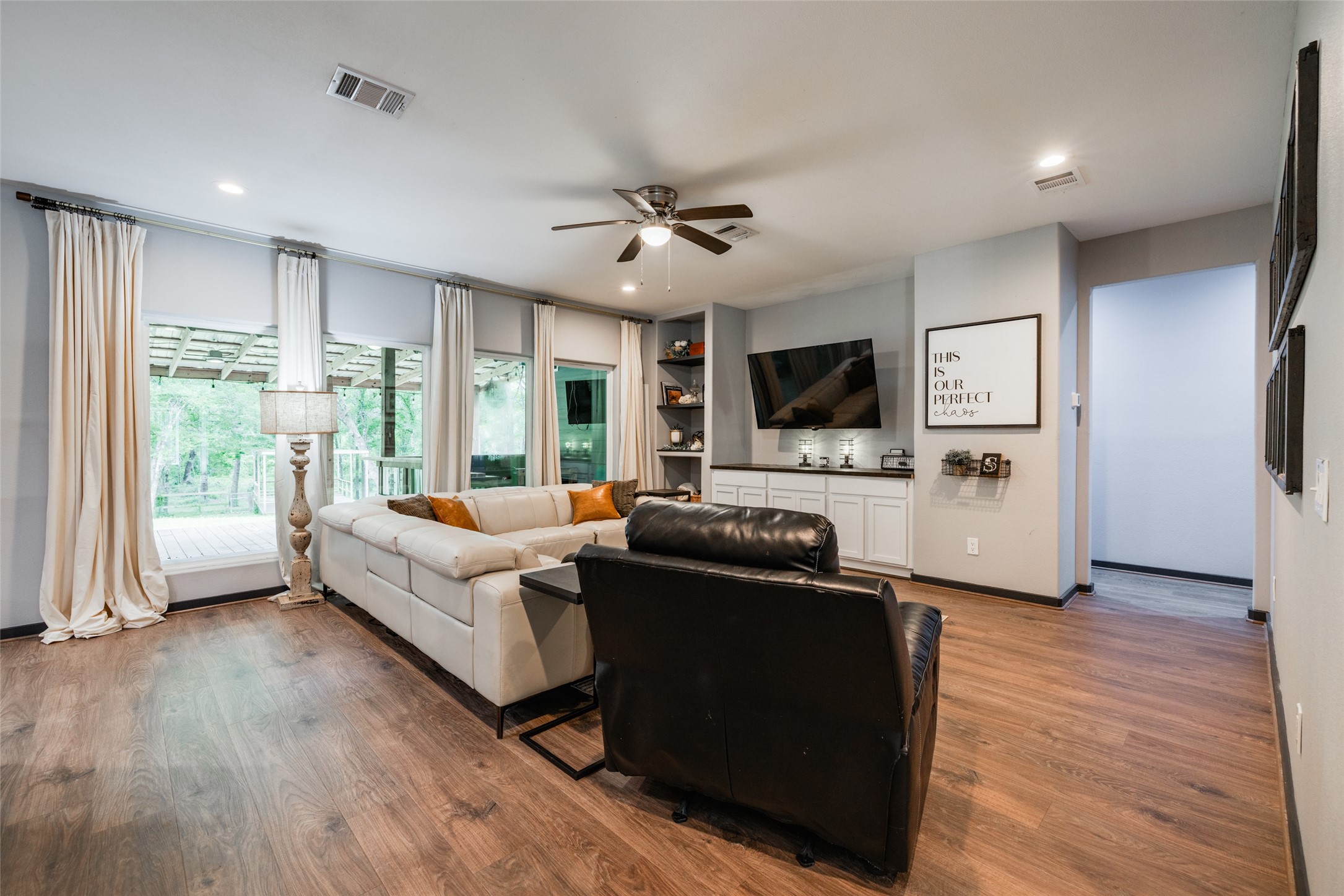 35 Disher Circle Huffman, TX 77336 - Photo 9 of 50 a living room with furniture fireplace and flat screen tv