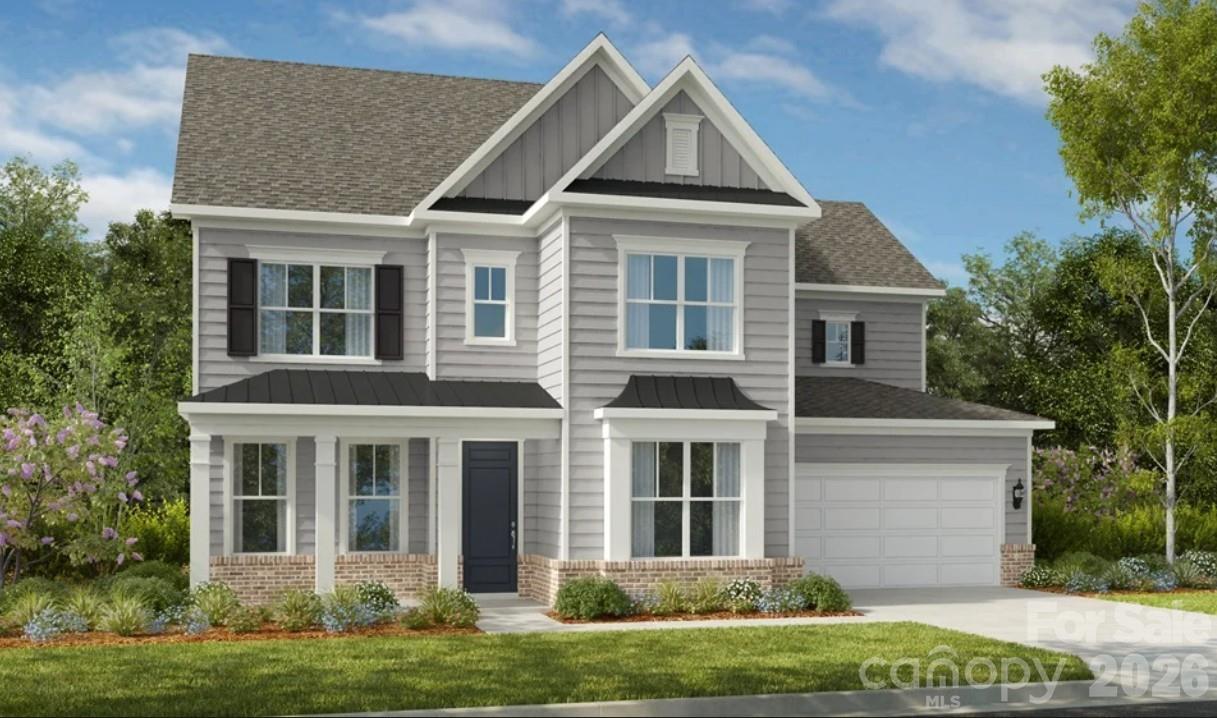 283 Stibbs Cross Road Mooresville, NC 28115 - Photo 2 of 43 front view of a house with a yard