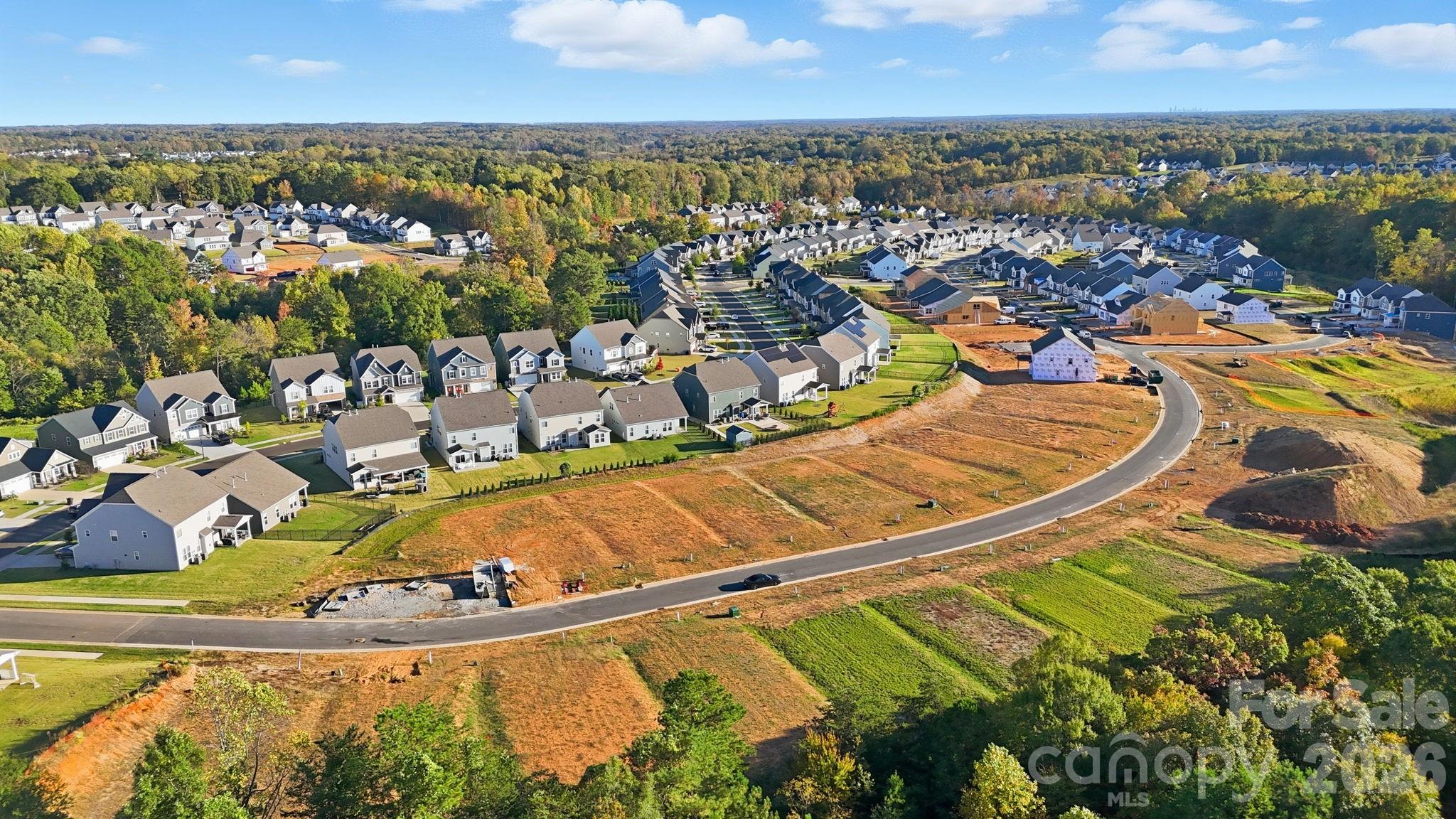 283 Stibbs Cross Road Mooresville, NC 28115 - Photo 39 of 43 an aerial view of residential houses with outdoor space