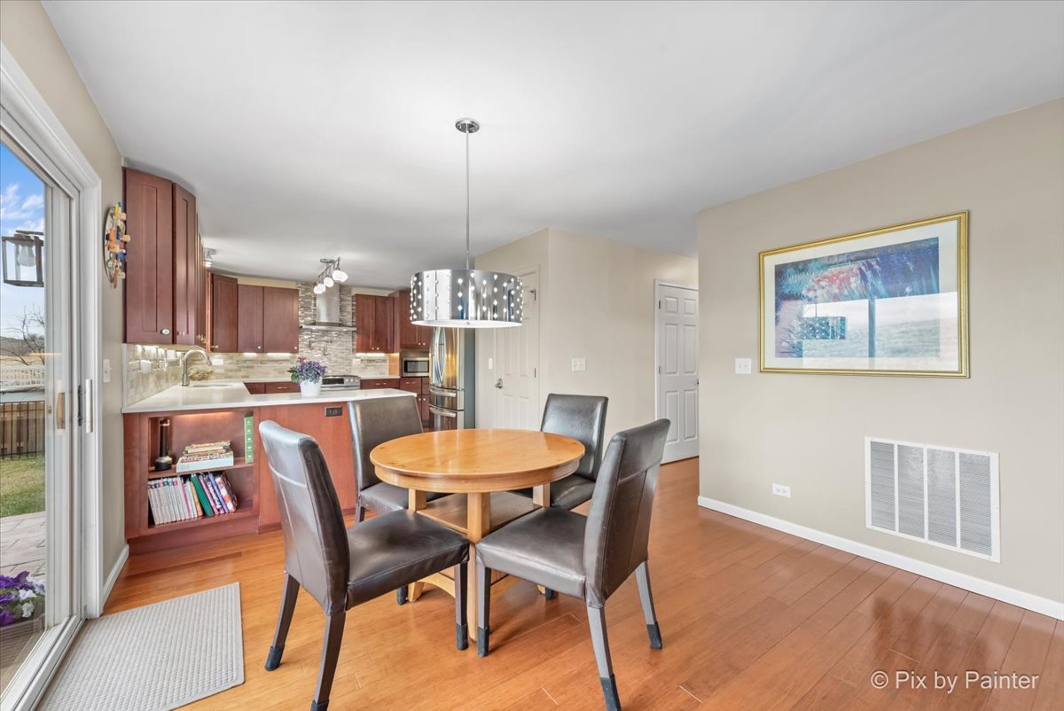4902 Stillwater Road Wonder Lake, IL 60097 - Photo 14 of 46 a view of a dining room with furniture