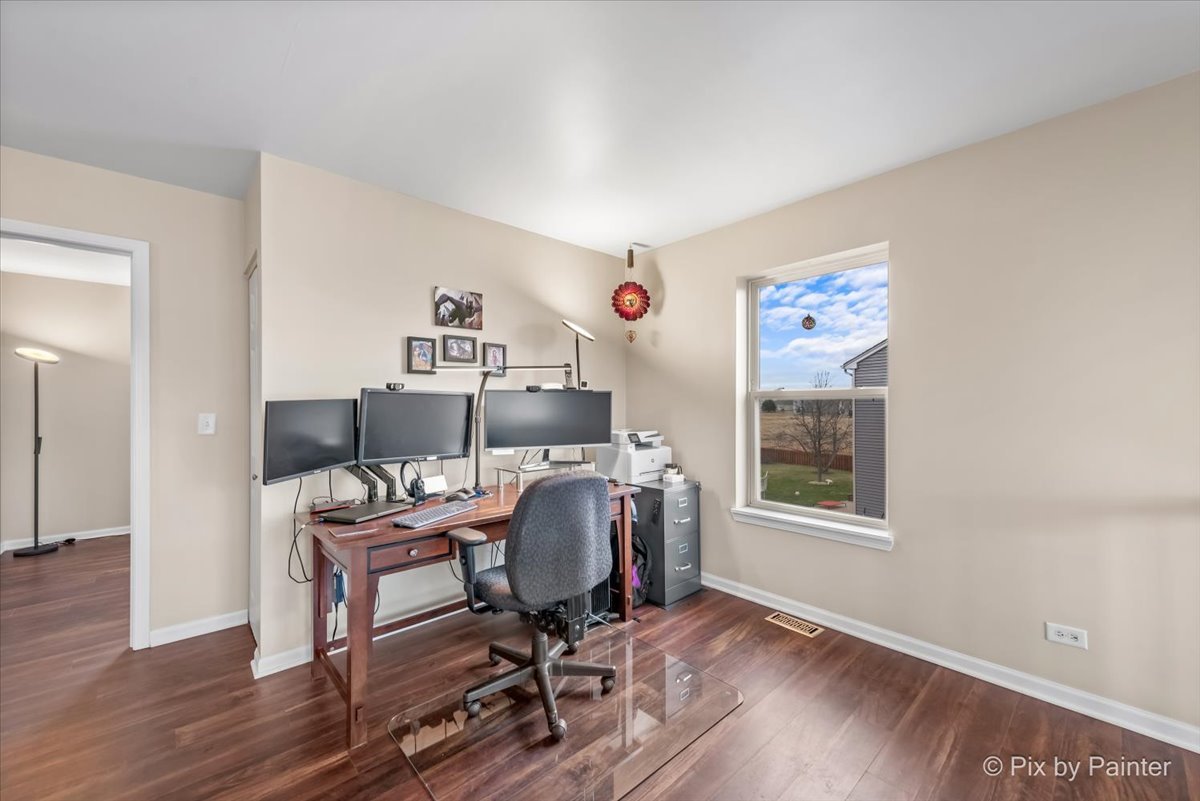 4902 Stillwater Road Wonder Lake, IL 60097 - Photo 19 of 46 a workspace with furniture and window