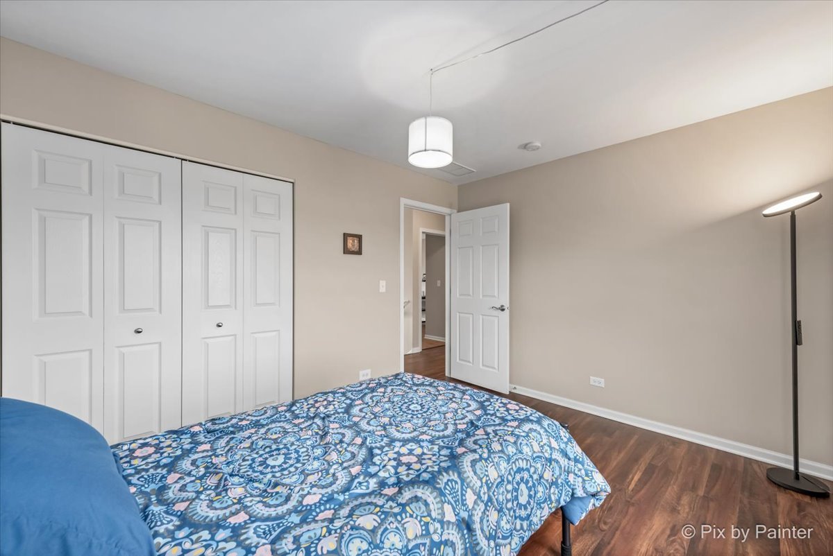 4902 Stillwater Road Wonder Lake, IL 60097 - Photo 22 of 46 a bedroom with a bed and a window