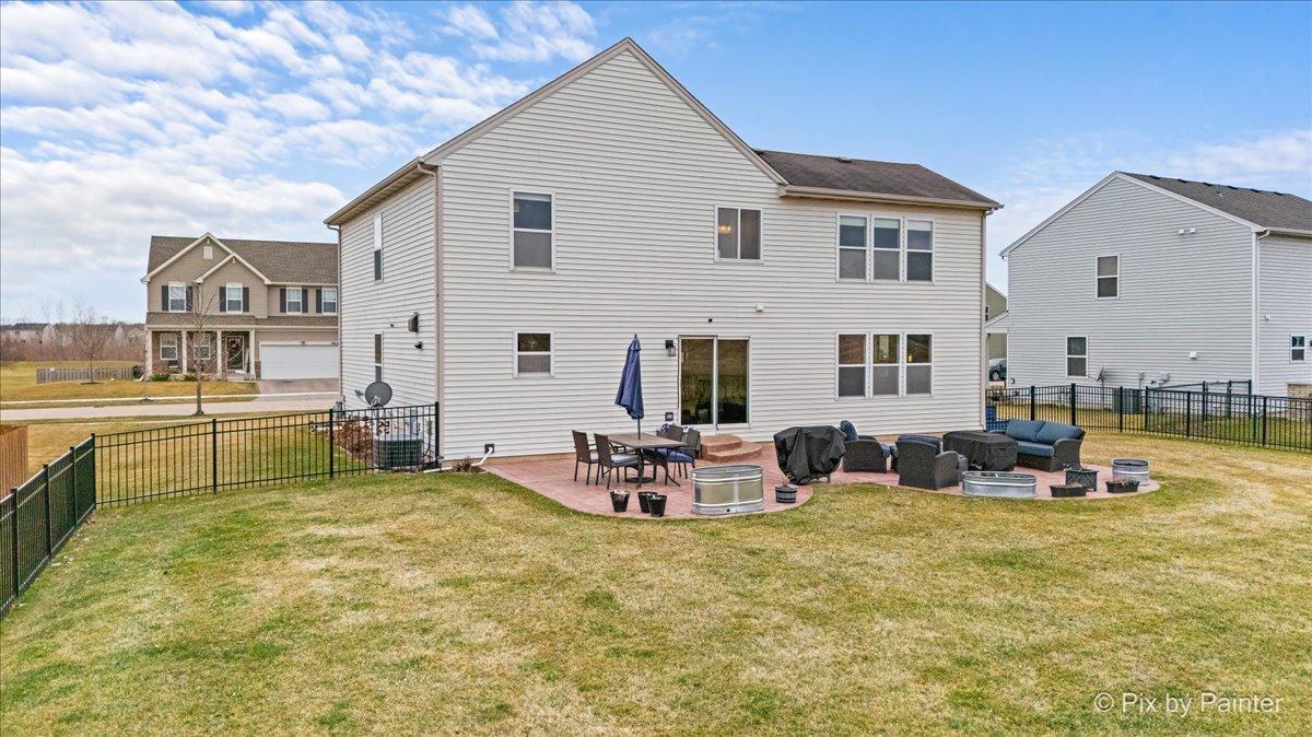 4902 Stillwater Road Wonder Lake, IL 60097 - Photo 38 of 46 a view of a house with swimming pool and sitting area