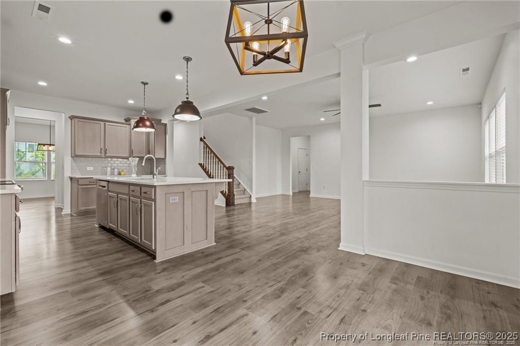 40 Arlie Lane Lillington, NC 27546 - Photo 13 of 39 an open kitchen with a sink and stove top oven