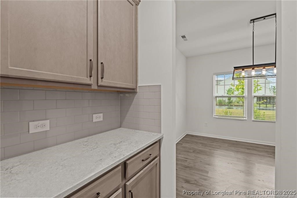 40 Arlie Lane Lillington, NC 27546 - Photo 19 of 39 a kitchen with a sink and cabinets