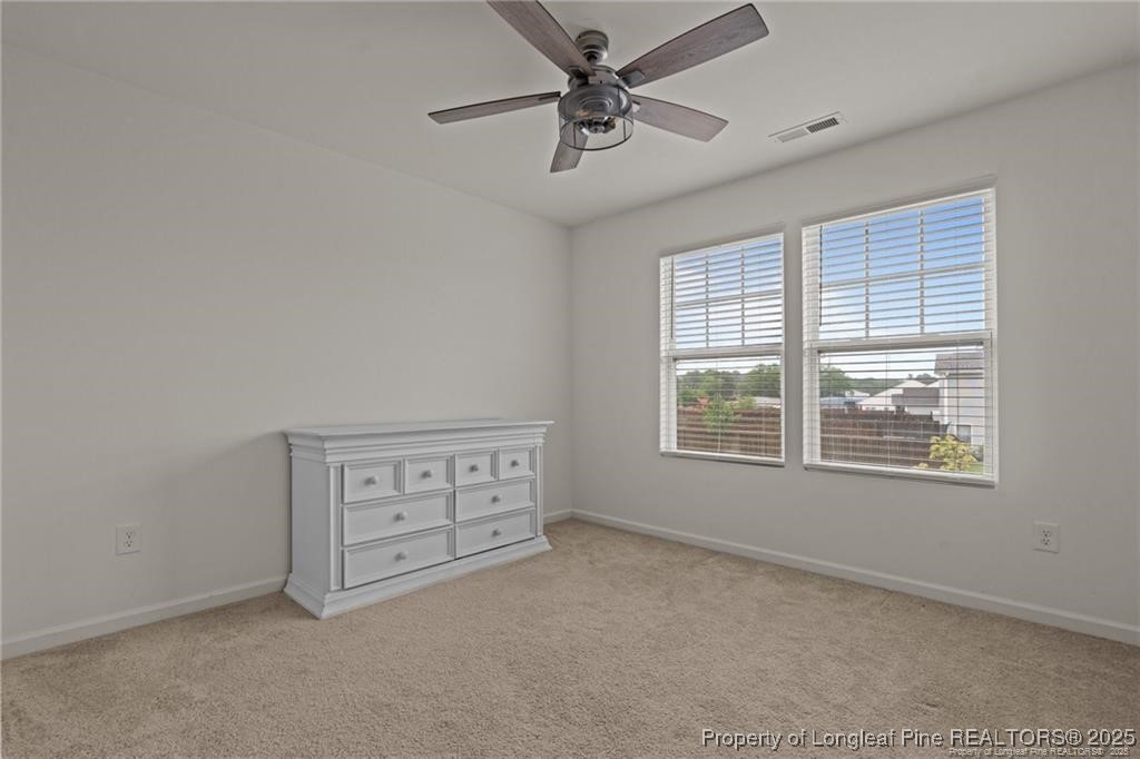 40 Arlie Lane Lillington, NC 27546 - Photo 27 of 39 a view of an empty room with a window