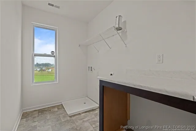 an aerial view of a house with a swimming pool
