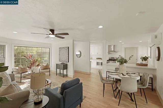 a view of a dining room with furniture window and outside view