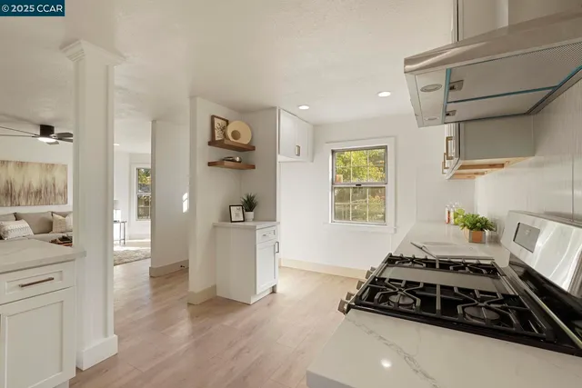 a bedroom with furniture and a wooden floor