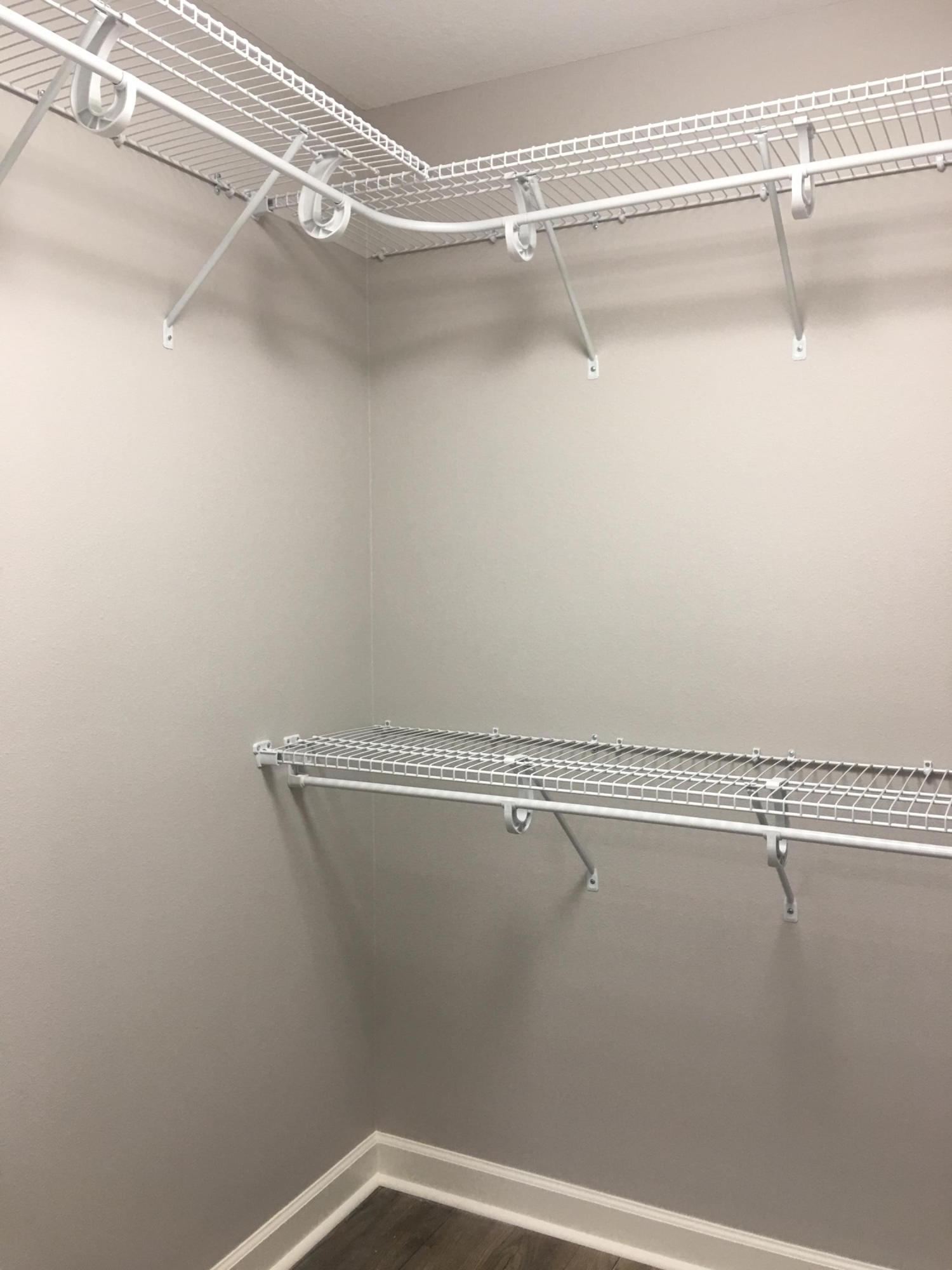 976 Valley Road Crestview, FL 32539 - Photo 17 of 26 a view of a room with racks on the wall