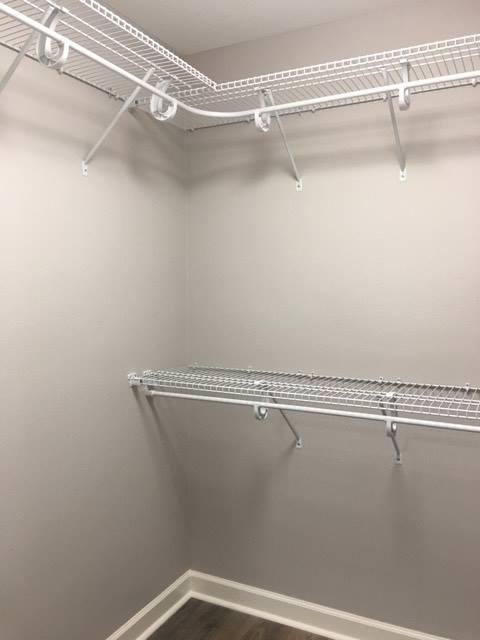 976 Valley Road Crestview, FL 32539 - Photo 23 of 26 a view of a room with racks on the wall