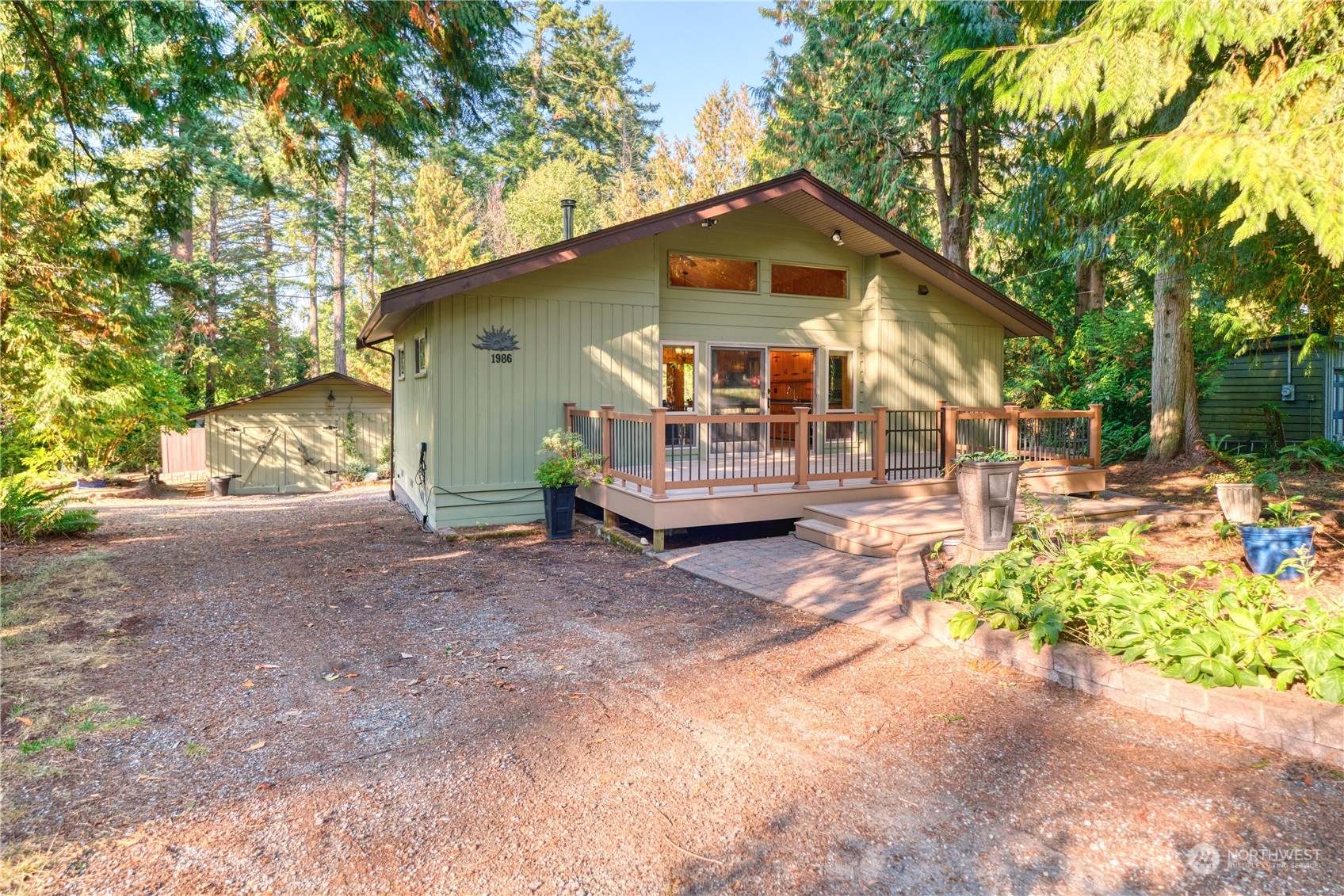 1986 Wellington Road Point Roberts, WA 98281 - Photo 1 of 26 a front view of a house with a yard