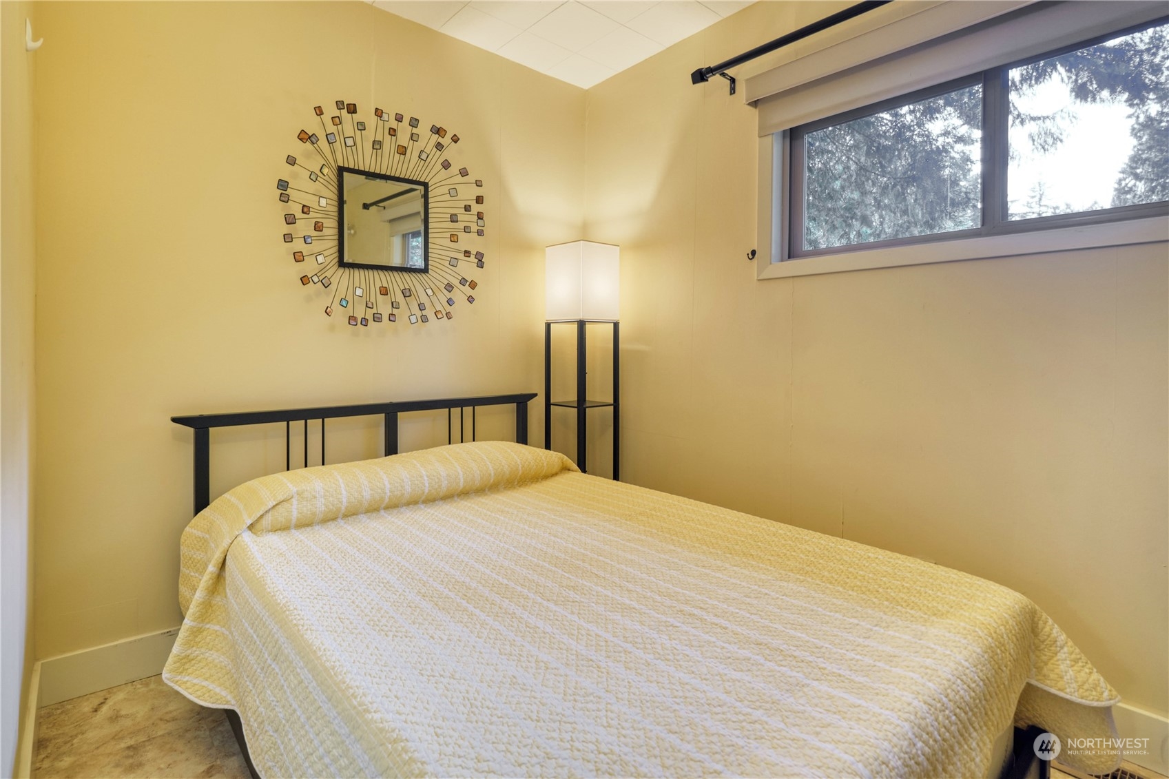 1986 Wellington Road Point Roberts, WA 98281 - Photo 11 of 26 a large bed sitting in a bedroom next to a window