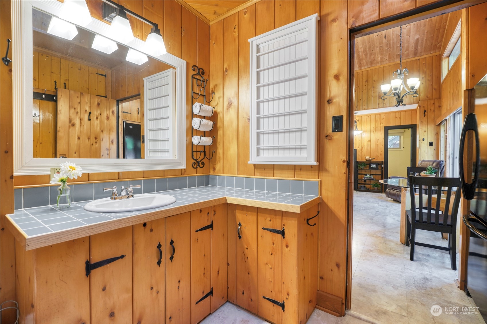 1986 Wellington Road Point Roberts, WA 98281 - Photo 15 of 26 a bathroom with a sink a mirror and a shower